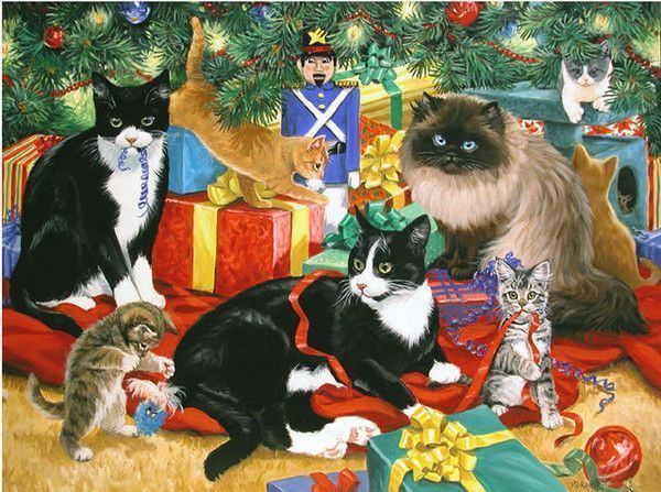 chats avec des chatons sous le sapin de Noël
